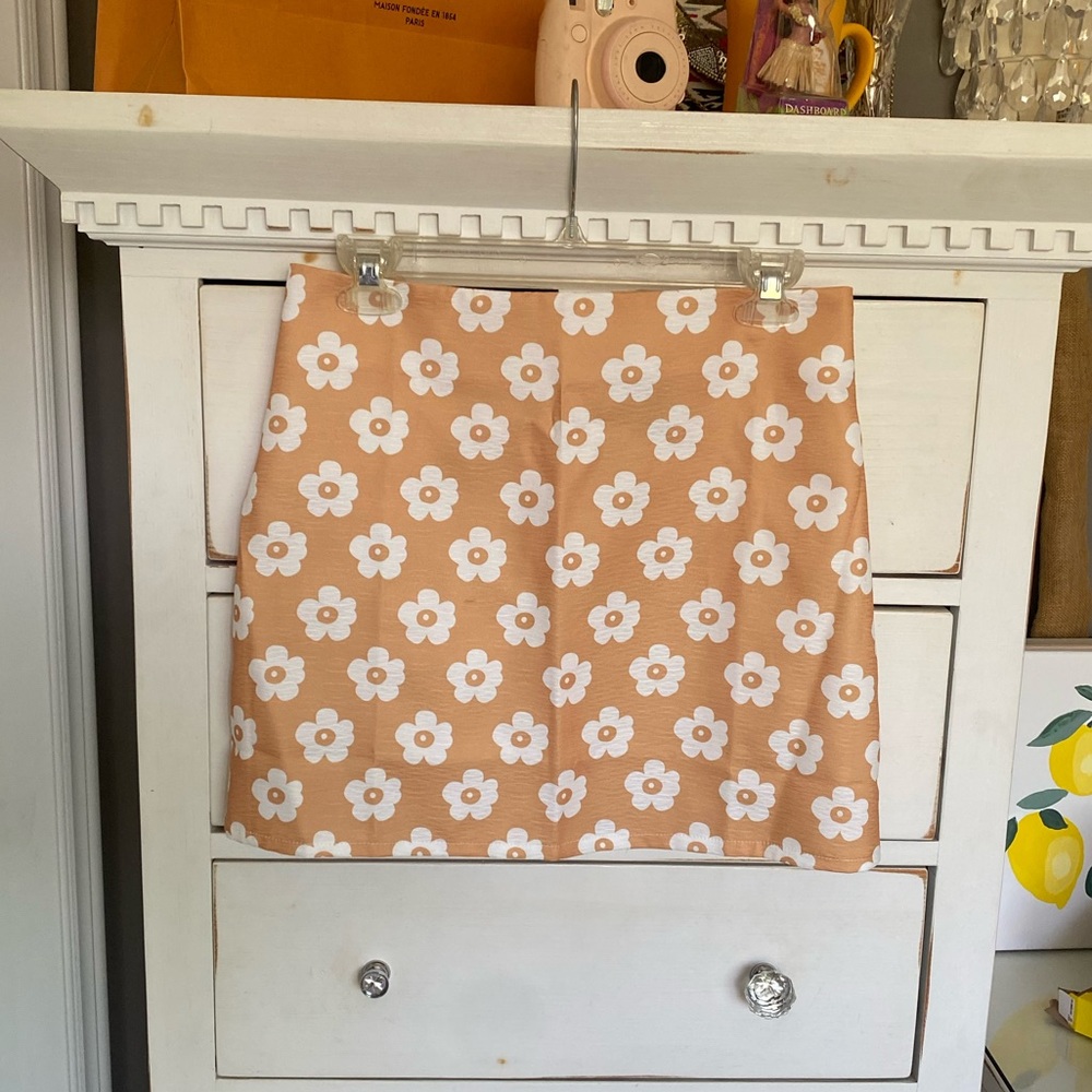 Yellow Mini Skirt with White Flowers.